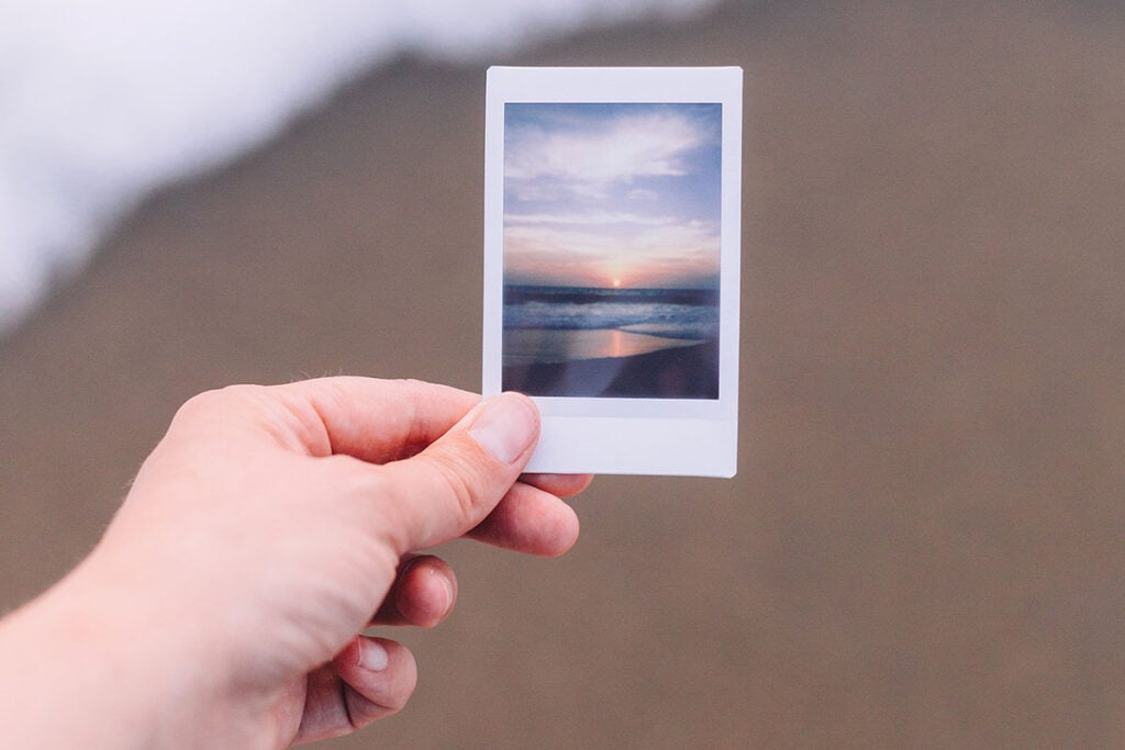 2023 Inspiration Quotes 2 vertical - woman holding polaroid on beach