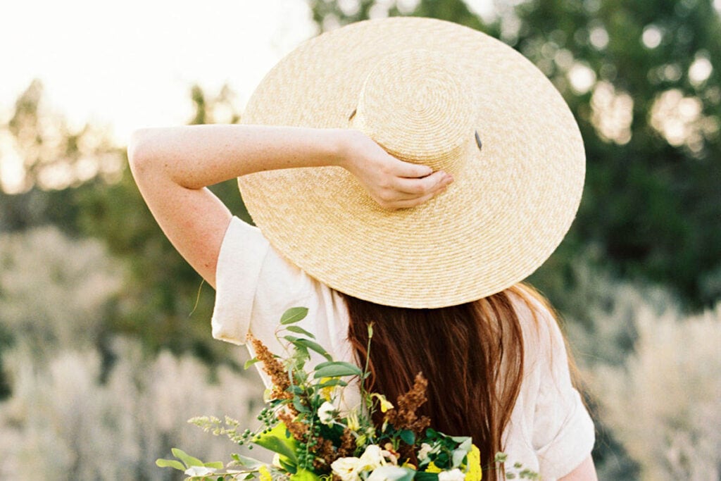 For your future self 1 - Women in field wearing straw hat