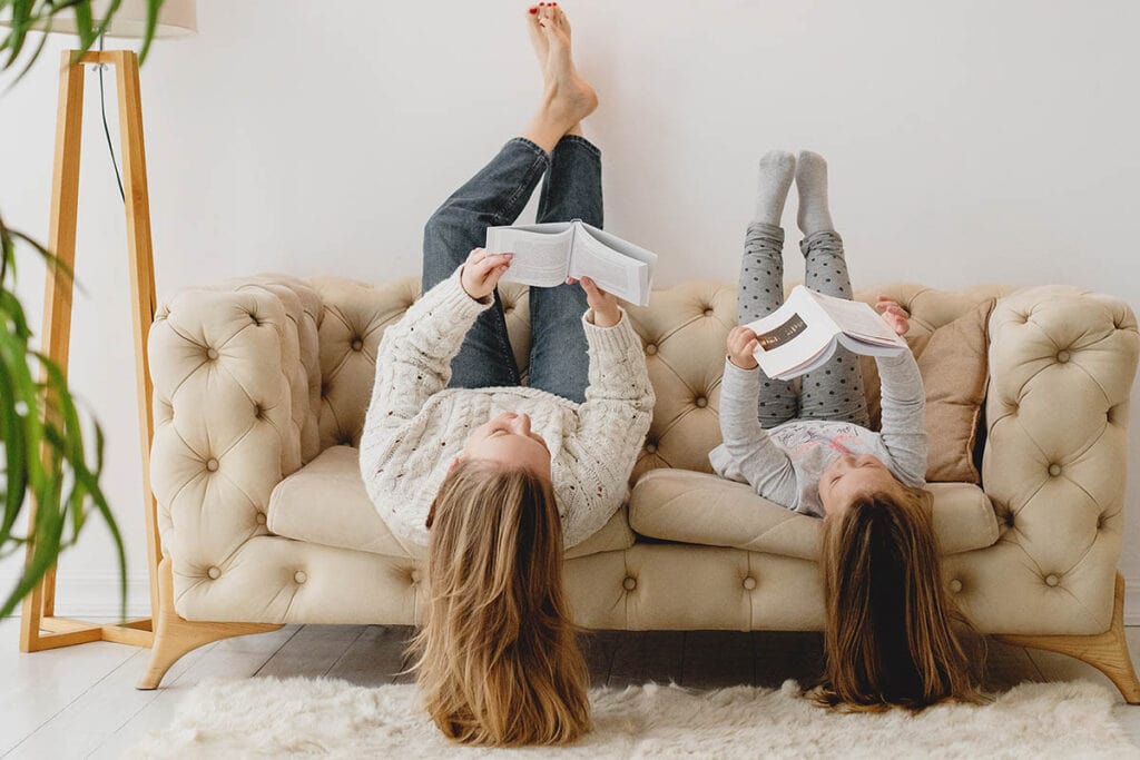 each Healthy Habits 6 - Mother/Daughter reading upside down on a couch