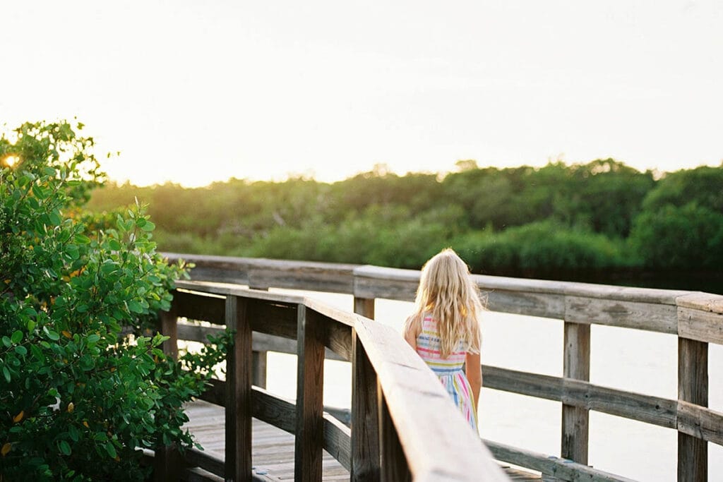 Teach Healthy Habits 7 _ Girl walking down a dock
